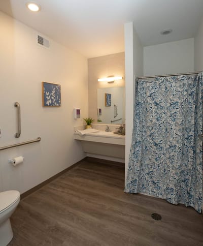 Clean, modern bathroom with amenities