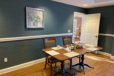 Cozy dining area with wooden tables and chairs