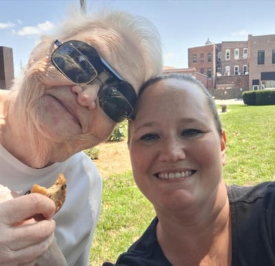 Residents enjoying time outdoors with cookies