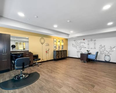 Interior view of a hair salon with styling stations