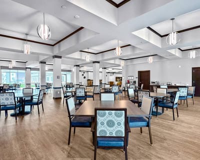 Elegant dining room with modern decor and bright lighting