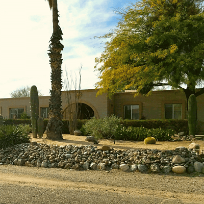 Exterior view of the assisted living facility with landscaping