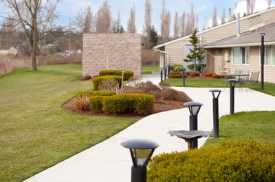 Well-maintained garden path with landscaping
