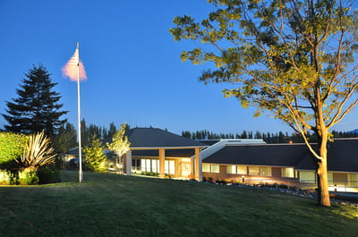 Exterior view of Life Care Center of Port Townsend at dusk