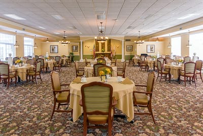 Elegant dining room setup with tables and chairs