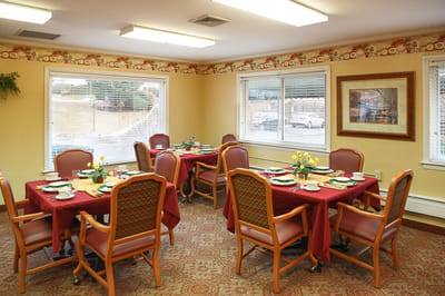 Well-set dining room with tables and chairs