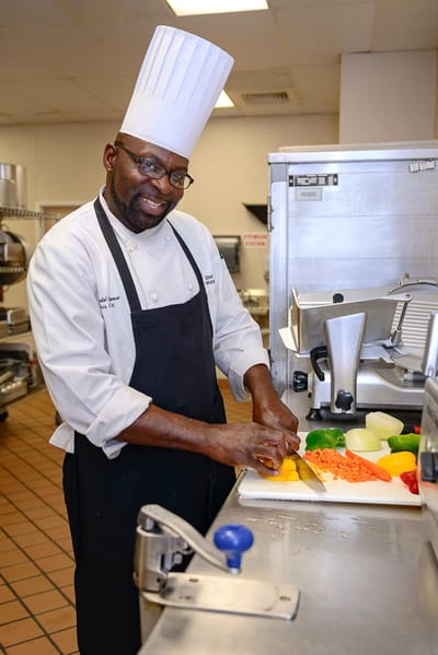 Chef preparing ingredients in the kitchen