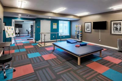 Bright interior of a therapy room with equipment