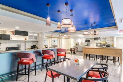 Bright dining area with modern decor and seating