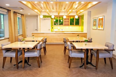 Bright dining room with modern tables and chairs