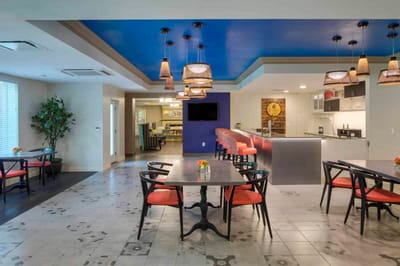 Bright dining area with tables and modern decor