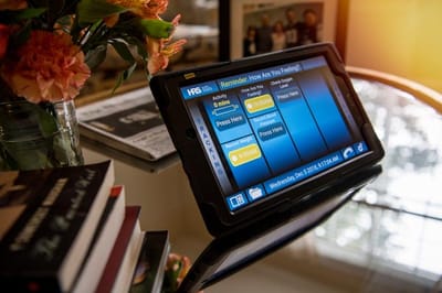 Lorien Bulle Rock, Nursing Home in Havre De Grace, MD — Tablet displaying activity schedule at a senior living facility