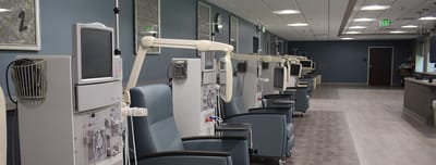 Interior of a dialysis treatment room with medical equipment