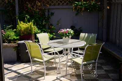Outdoor seating area with a table and chairs