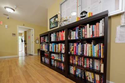 Interior view of a common area with bookshelves