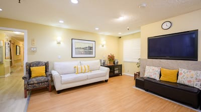 Bright common area with seating and decor