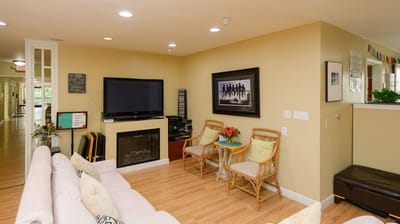 Cozy common area with seating and a television