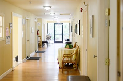 Hallway with seating area in a senior living facility