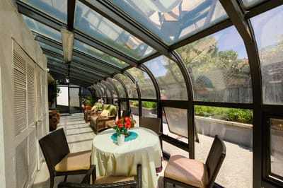 Indoor garden area with seating and flowers