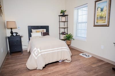 Cozy private resident room with warm decor