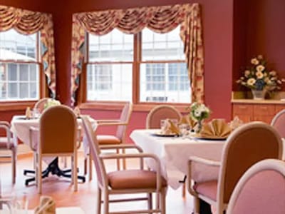 Dining room with tables set for meals