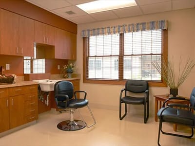 Bright, empty waiting area with chairs and natural light