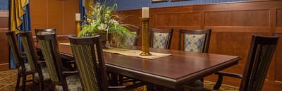 Dining room set for a meal in a senior living facility