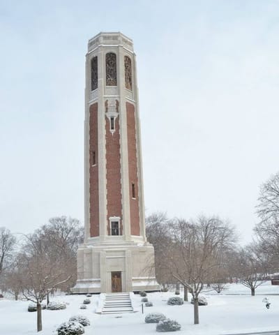 Exterior view of a tall building tower in winter