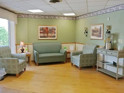 Cozy common area with comfortable seating and art