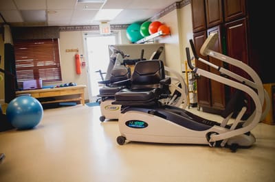 Fitness area with exercise equipment and therapy tools