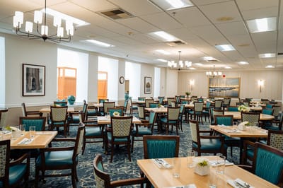 Dining room with tables set for meals