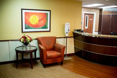Interior lobby area with seating and reception desk