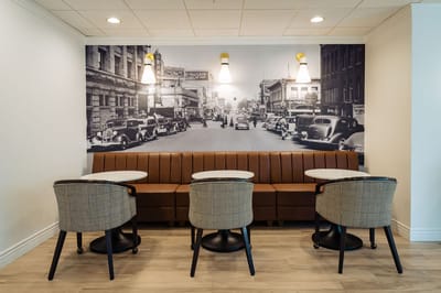 Interior seating area with a vintage mural