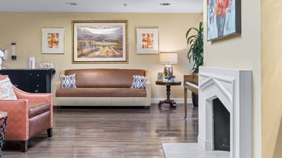 Cozy common area with seating and artwork