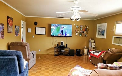 Cozy common area with comfortable seating and a TV