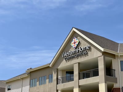 Facility logo displayed on the building exterior.