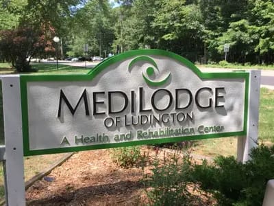Sign for Medilodge of Ludington outside the facility