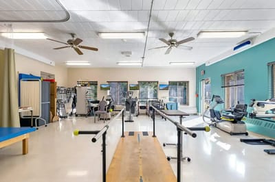 Interior view of a rehabilitation room with equipment