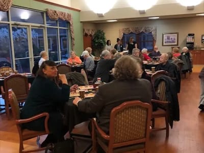 Residents enjoying a meal in the dining room