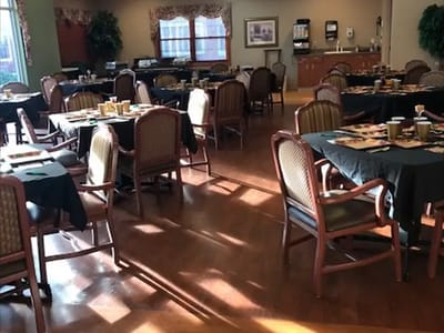 Dining area with tables set for meals