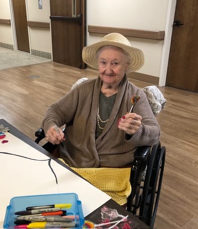 Resident engaged in an arts and crafts activity