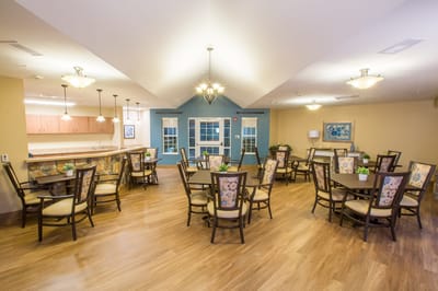 Bright dining area with tables and chairs