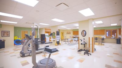 Physical therapy room with equipment