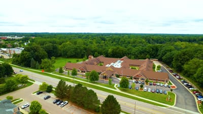 Aerial view of Medilodge of Okemos surrounded by greenery
