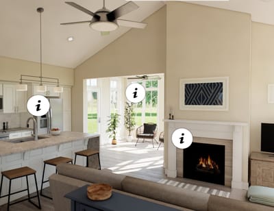 Bright common area with a fireplace and kitchen.