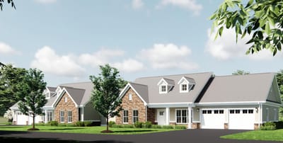 Exterior of a senior living facility with landscaping.
