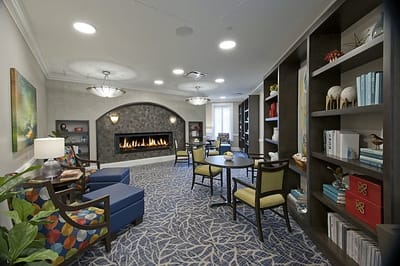 Cozy common area with seating and a fireplace