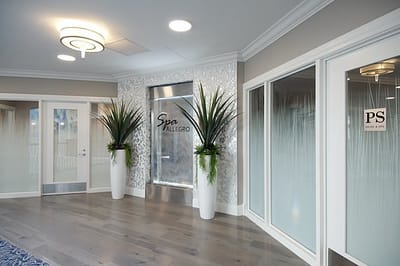 Interior view of a spa area with decorative plants