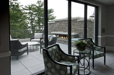 Interior lounge area with access to an outdoor space
