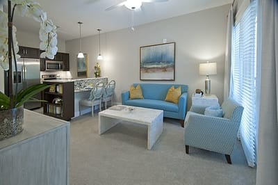 Bright, modern interior lounge area with furniture